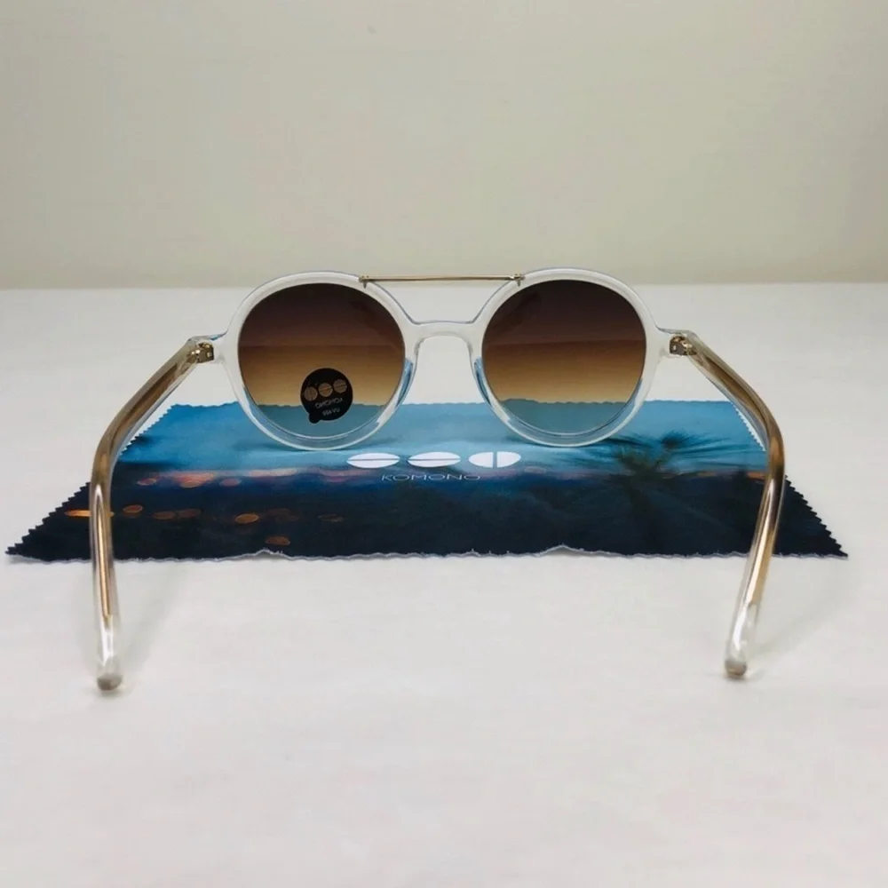 KOMONO Round Clear Sunglasses with Brown Gradient Lenses The Vivien